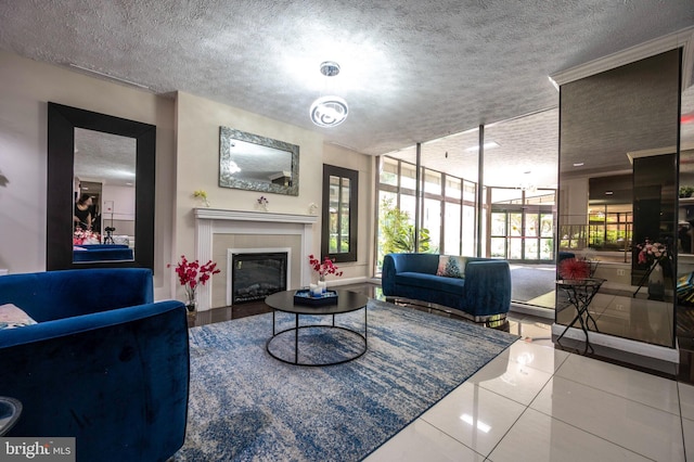 1111 Arlington Blvd Unit 707, Arlington, VA 22209 - living area featuring a tile fireplace, a textured ceiling, and tile patterned floors