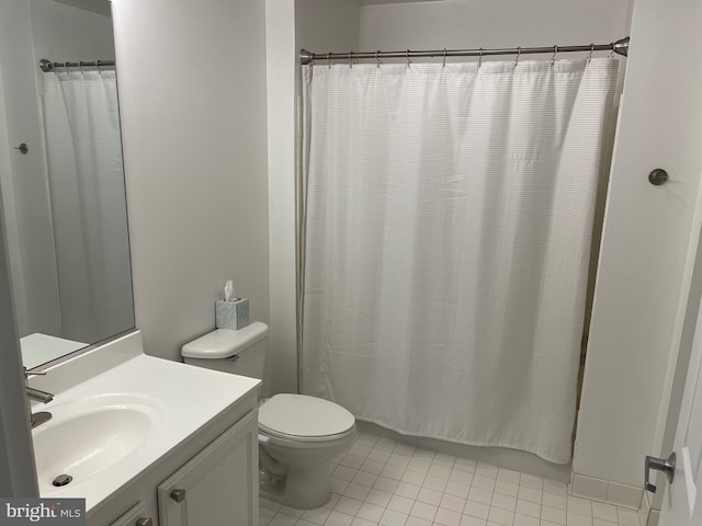 23 Pierside Dr Unit T-12, Baltimore, MD 21230 - bathroom with vanity, tile patterned floors, and shower / tub combo with curtain
