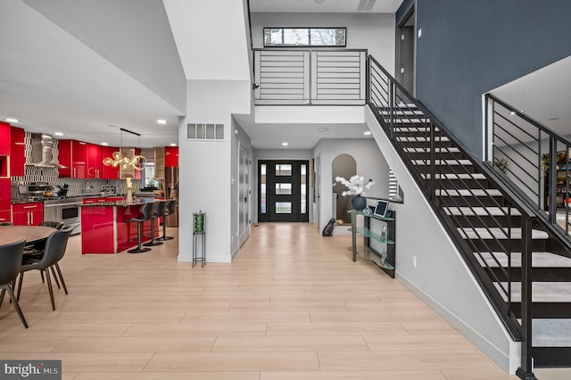 110 Rue Du Boise, Cherry Hill, NJ 08003 - foyer entrance with stairs, a towering ceiling, light wood-style flooring, a chandelier, and recessed lighting