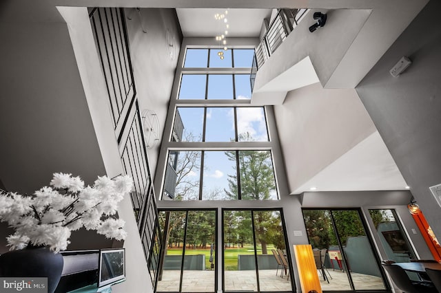 110 Rue Du Boise, Cherry Hill, NJ 08003 - unfurnished living room featuring a towering ceiling and a chandelier
