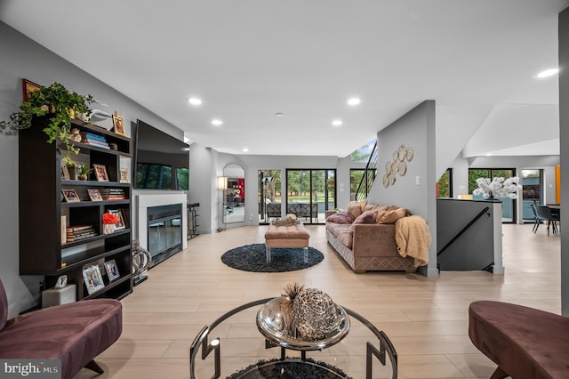 110 Rue Du Boise, Cherry Hill, NJ 08003 - living room with a glass covered fireplace, recessed lighting, and wood finished floors