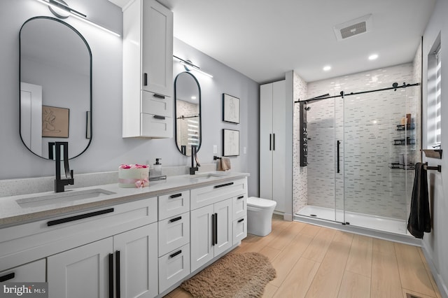 110 Rue Du Boise, Cherry Hill, NJ 08003 - full bath with a stall shower, double vanity, and wood finished floors