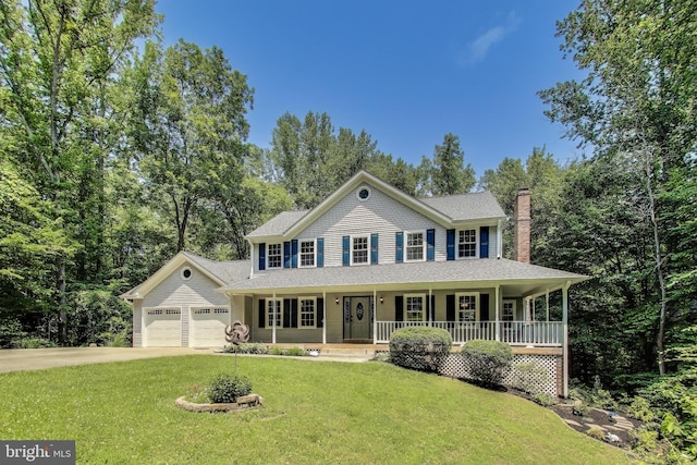 6260 Alpine Ct, Sunderland, MD 20689 - colonial inspired home featuring a porch, a chimney, a garage, driveway, and a front yard