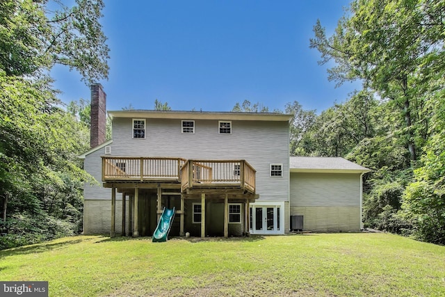 6260 Alpine Ct, Sunderland, MD 20689 - back of property with french doors, a lawn, a deck, and a chimney