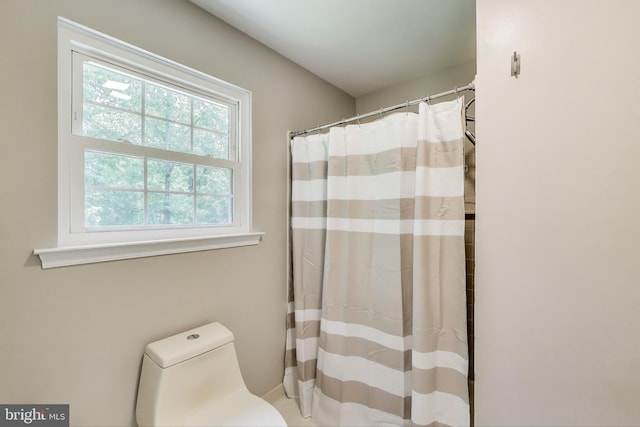 6260 Alpine Ct, Sunderland, MD 20689 - bathroom with toilet and a shower with curtain