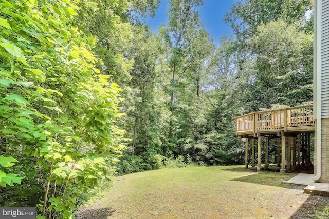 6260 Alpine Ct, Sunderland, MD 20689 - view of green lawn featuring stairway and a wooden deck