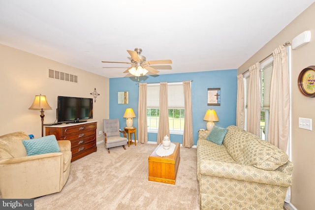 22890 Zoar Rd, Georgetown, DE 19947 - living area with a ceiling fan and carpet flooring
