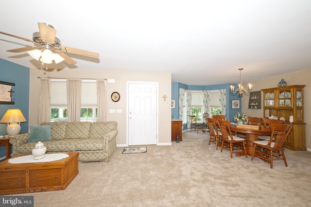 22890 Zoar Rd, Georgetown, DE 19947 - carpeted living area with a chandelier and ceiling fan