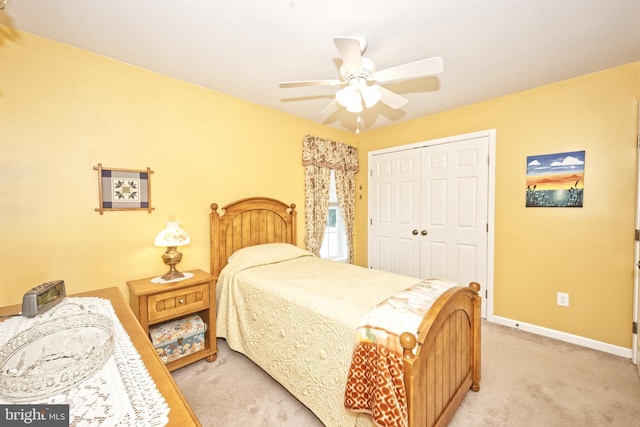 22890 Zoar Rd, Georgetown, DE 19947 - bedroom featuring light colored carpet, a closet, and a ceiling fan