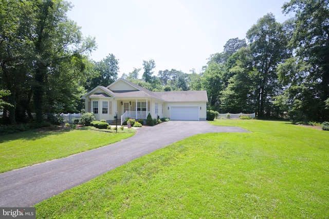 22890 Zoar Rd, Georgetown, DE 19947 - view of front facade with a porch, asphalt driveway, and an attached garage