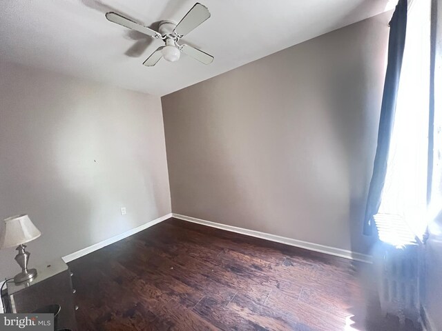 2238 N Bancroft St, Philadelphia, PA 19132 - empty room with ceiling fan and dark wood-type flooring