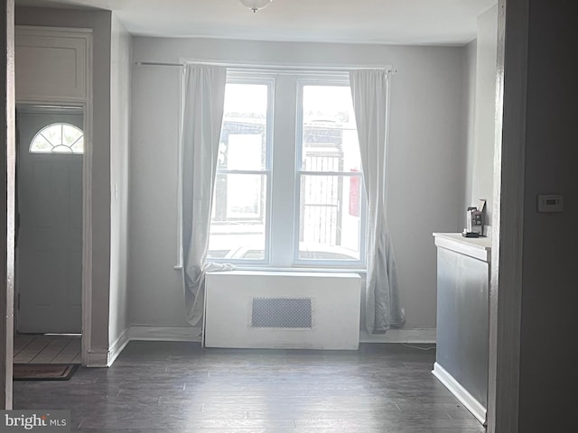 2238 N Bancroft St, Philadelphia, PA 19132 - foyer with radiator heating unit and wood finished floors