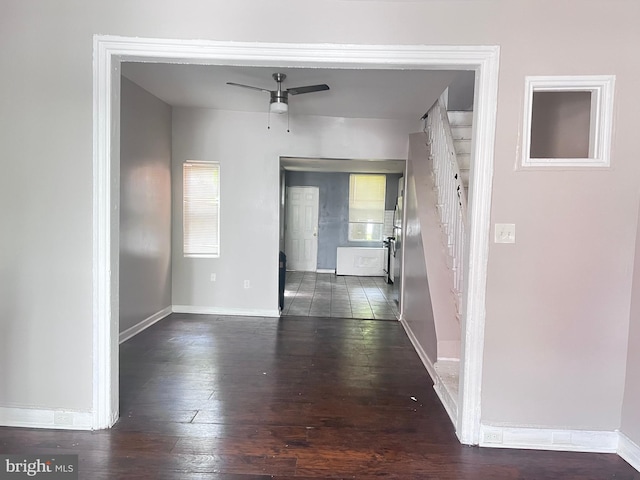 2238 N Bancroft St, Philadelphia, PA 19132 - corridor featuring dark wood-style flooring and baseboards