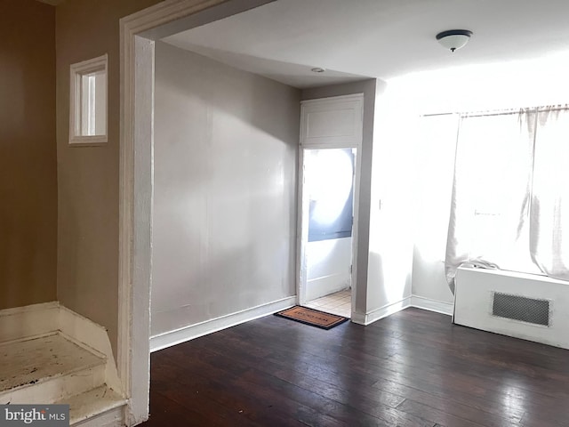 2238 N Bancroft St, Philadelphia, PA 19132 - foyer featuring dark wood-type flooring and baseboards