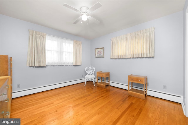 1122 N 14th St, Allentown, PA 18102 - sitting room featuring wood finished floors and a ceiling fan