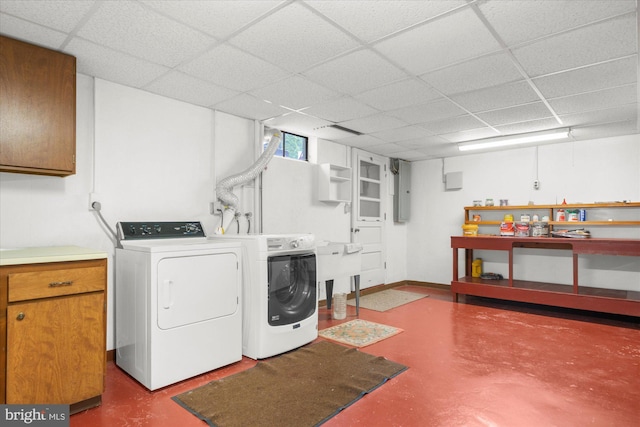 1122 N 14th St, Allentown, PA 18102 - laundry room with washing machine and clothes dryer, cabinet space, and electric panel