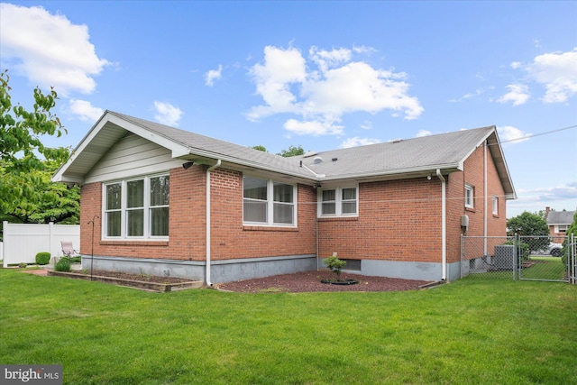 1122 N 14th St, Allentown, PA 18102 - rear view of house with brick siding and a gate
