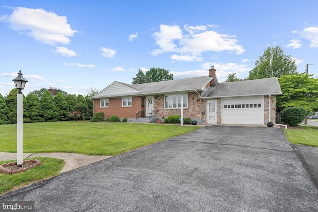 1122 N 14th St, Allentown, PA 18102 - single story home featuring a garage, asphalt driveway, a front yard, a chimney, and brick siding