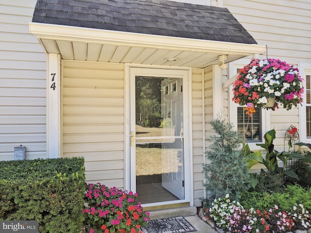 74 Avon Ln Unit 7D, New Hope, PA 18938 - property entrance with roof with shingles