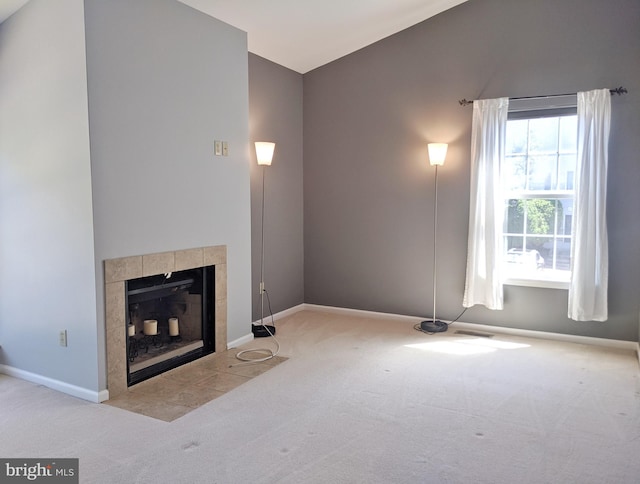 74 Avon Ln Unit 7D, New Hope, PA 18938 - unfurnished living room featuring carpet and a tile fireplace
