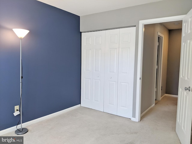 74 Avon Ln Unit 7D, New Hope, PA 18938 - unfurnished bedroom featuring light carpet and a closet