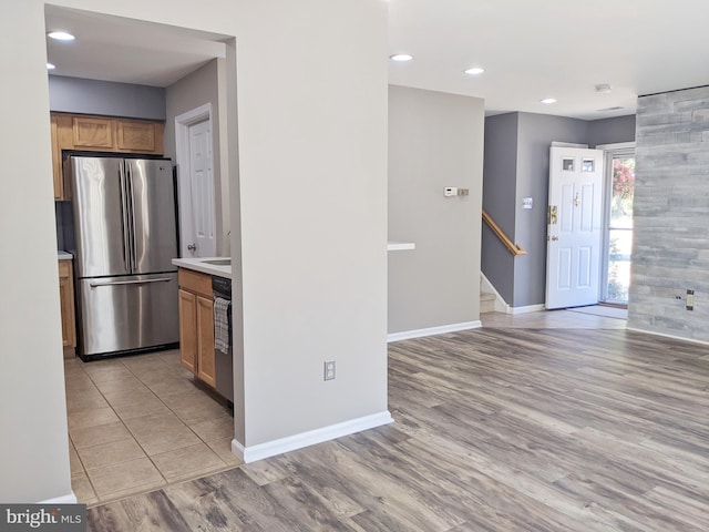 74 Avon Ln Unit 7D, New Hope, PA 18938 - kitchen with appliances with stainless steel finishes, light wood-type flooring, light countertops, and recessed lighting