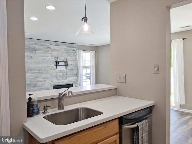 74 Avon Ln Unit 7D, New Hope, PA 18938 - kitchen featuring stainless steel dishwasher, light countertops, decorative light fixtures, recessed lighting, and wood finished floors