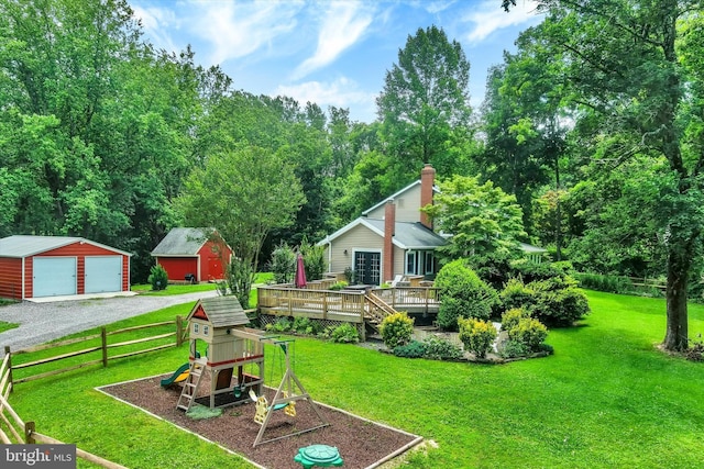 17435 Big Falls Rd, Monkton, MD 21111 - view of yard with a playground, an outdoor structure, a garage, and a deck