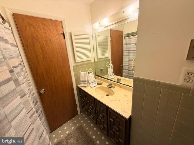 170 E Holly Ln, Tuckerton, NJ 08087 - full bathroom with tile walls, vanity, and a wainscoted wall
