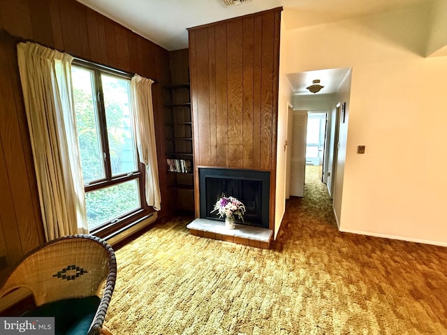 170 E Holly Ln, Tuckerton, NJ 08087 - living room with healthy amount of natural light, a large fireplace, built in features, carpet flooring, and wood walls
