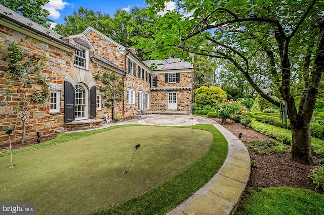 6316 Mossway, Baltimore, MD 21212 - view of yard with a putting green, a patio area, and french doors