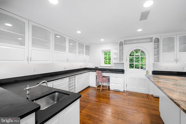 6316 Mossway, Baltimore, MD 21212 - kitchen featuring open shelves, built in study area, white cabinets, recessed lighting, and glass insert cabinets