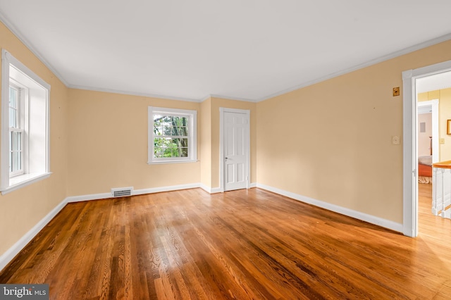 6316 Mossway, Baltimore, MD 21212 - spare room with wood finished floors and crown molding