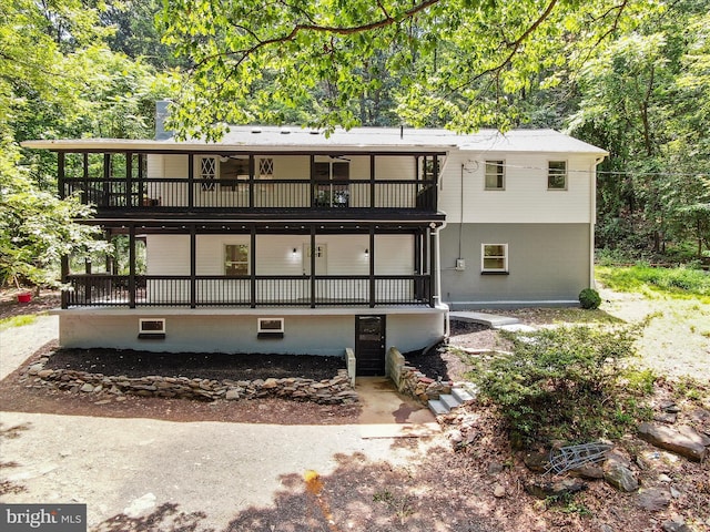 502 Windsong Rd, Harpers Ferry, WV 25425 - rear view of house featuring a balcony