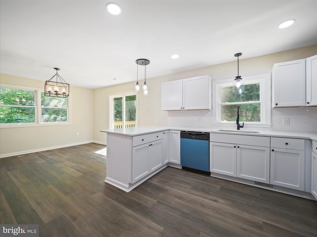 502 Windsong Rd, Harpers Ferry, WV 25425 - kitchen featuring dishwasher, a peninsula, dark wood-style floors, light countertops, and recessed lighting