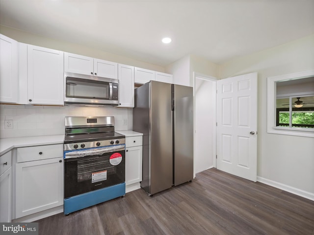 502 Windsong Rd, Harpers Ferry, WV 25425 - kitchen featuring stainless steel appliances, dark wood-style floors, white cabinets, light countertops, and backsplash