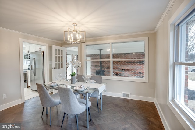 2502 Rancocas Rd, Burlington, NJ 08016 - dining area featuring a chandelier, healthy amount of natural light, and crown molding