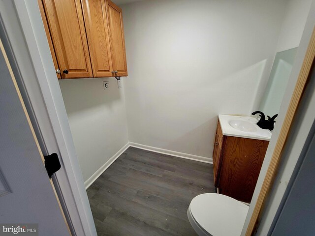 110 N Mulberry St, Hagerstown, MD 21740 - bathroom featuring vanity and wood finished floors
