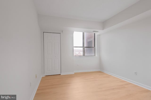 4808 Moorland Ln Unit 613, Bethesda, MD 20814 - empty room with light wood finished floors and baseboards