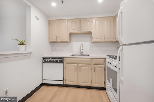 4808 Moorland Ln Unit 613, Bethesda, MD 20814 - kitchen with white appliances, light wood-style flooring, light countertops, and recessed lighting