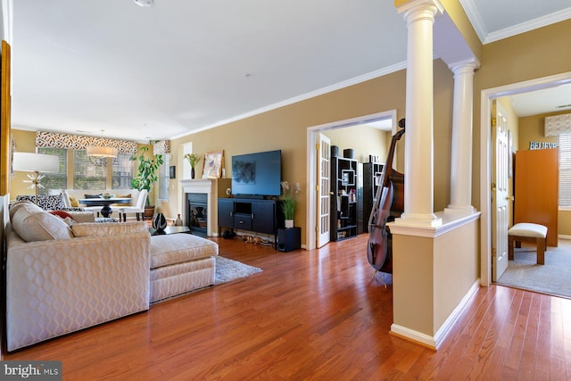 13801 Belle Chasse Blvd Unit 213, Laurel, MD 20707 - living room featuring decorative columns, wood finished floors, and ornamental molding