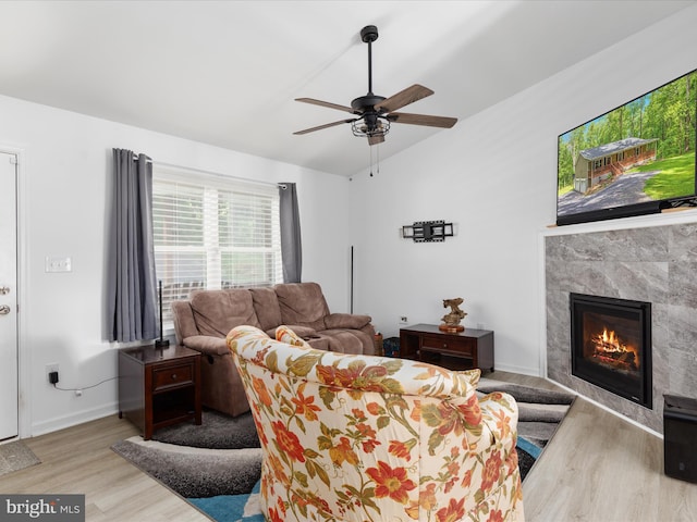 295 Rocky Mount Rd, Linden, VA 22642 - living room with lofted ceiling, wood finished floors, a fireplace, healthy amount of natural light, and ceiling fan