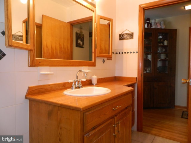 201 Cherry St, Millheim, PA 16854 - bathroom with vanity, tile walls, and tile patterned floors