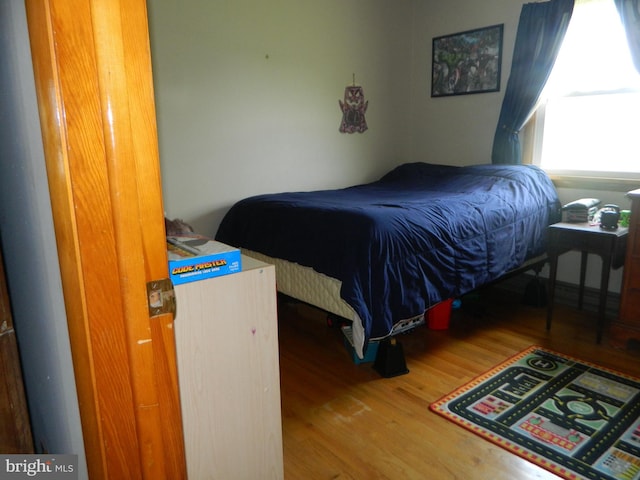 201 Cherry St, Millheim, PA 16854 - bedroom featuring wood finished floors