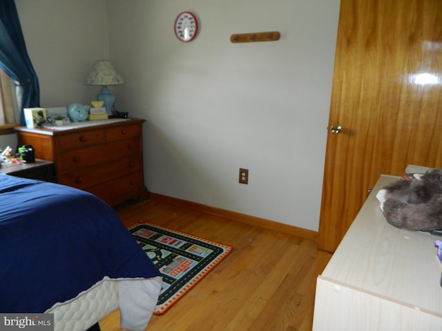 201 Cherry St, Millheim, PA 16854 - bedroom featuring wood finished floors and baseboards
