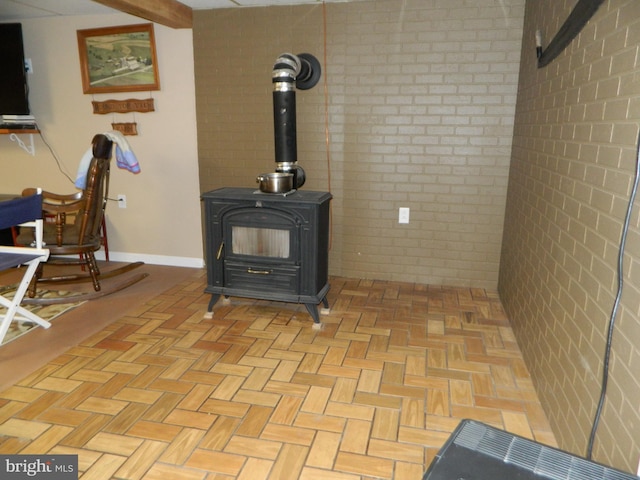 201 Cherry St, Millheim, PA 16854 - detailed view of brick wall and a wood stove