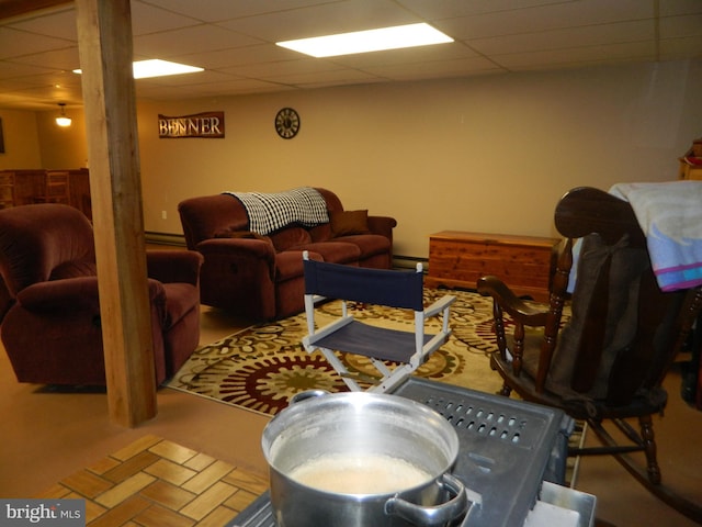 201 Cherry St, Millheim, PA 16854 - living area featuring baseboard heating and a drop ceiling