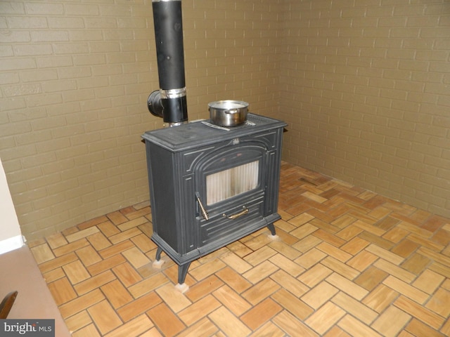 201 Cherry St, Millheim, PA 16854 - detailed view of brick wall and a wood stove