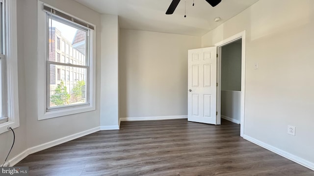3436 D St, Philadelphia, PA 19134 - spare room featuring healthy amount of natural light, a ceiling fan, dark wood-style flooring, and a smoke detector