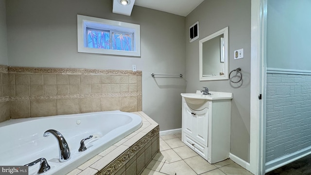 3436 D St, Philadelphia, PA 19134 - bathroom featuring vanity, a tub with jets, and tile patterned flooring